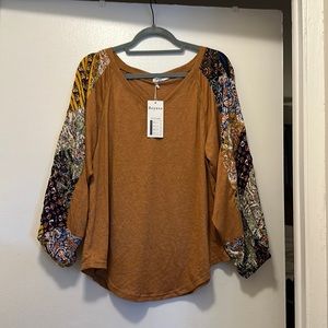 Rust color bohemian style shirt with colorful sleeves